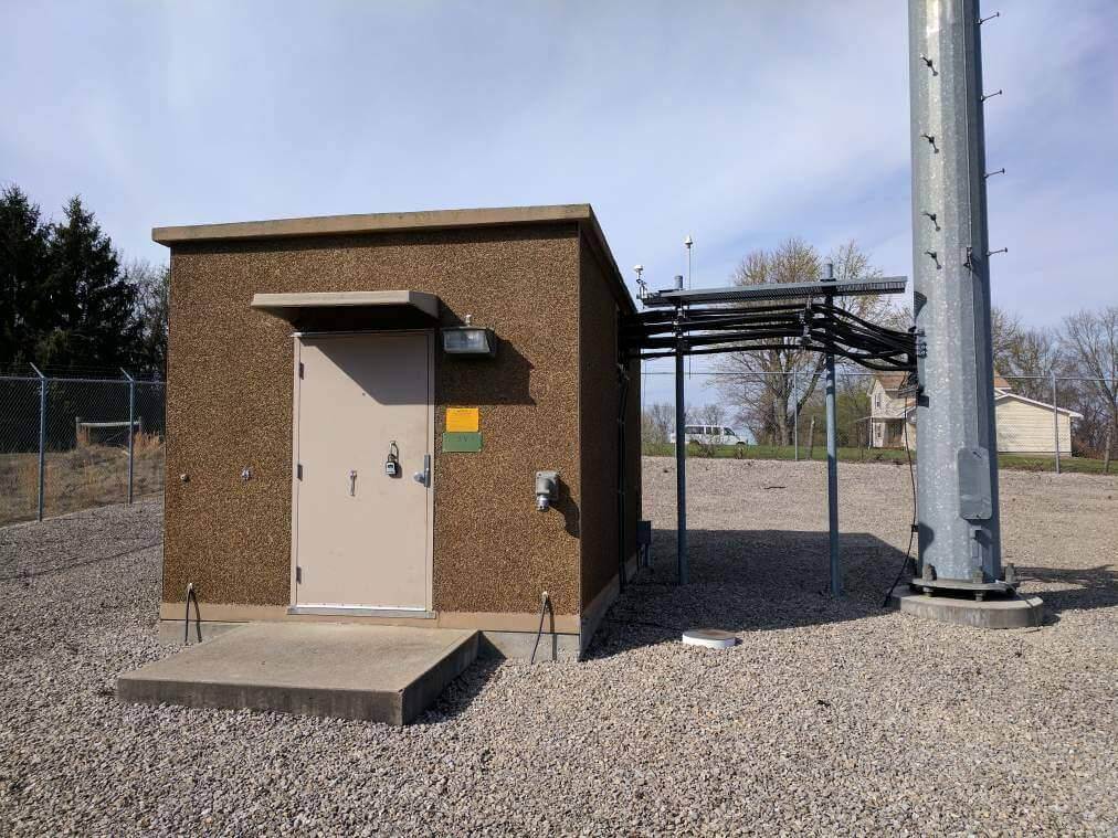 Pit toilets with two stalls at a rest area in Benton County Washington, a rural area