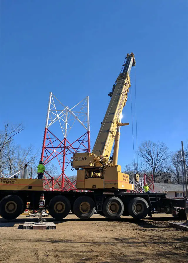 Mobile crane is carry concrete joist to assembly huge hall