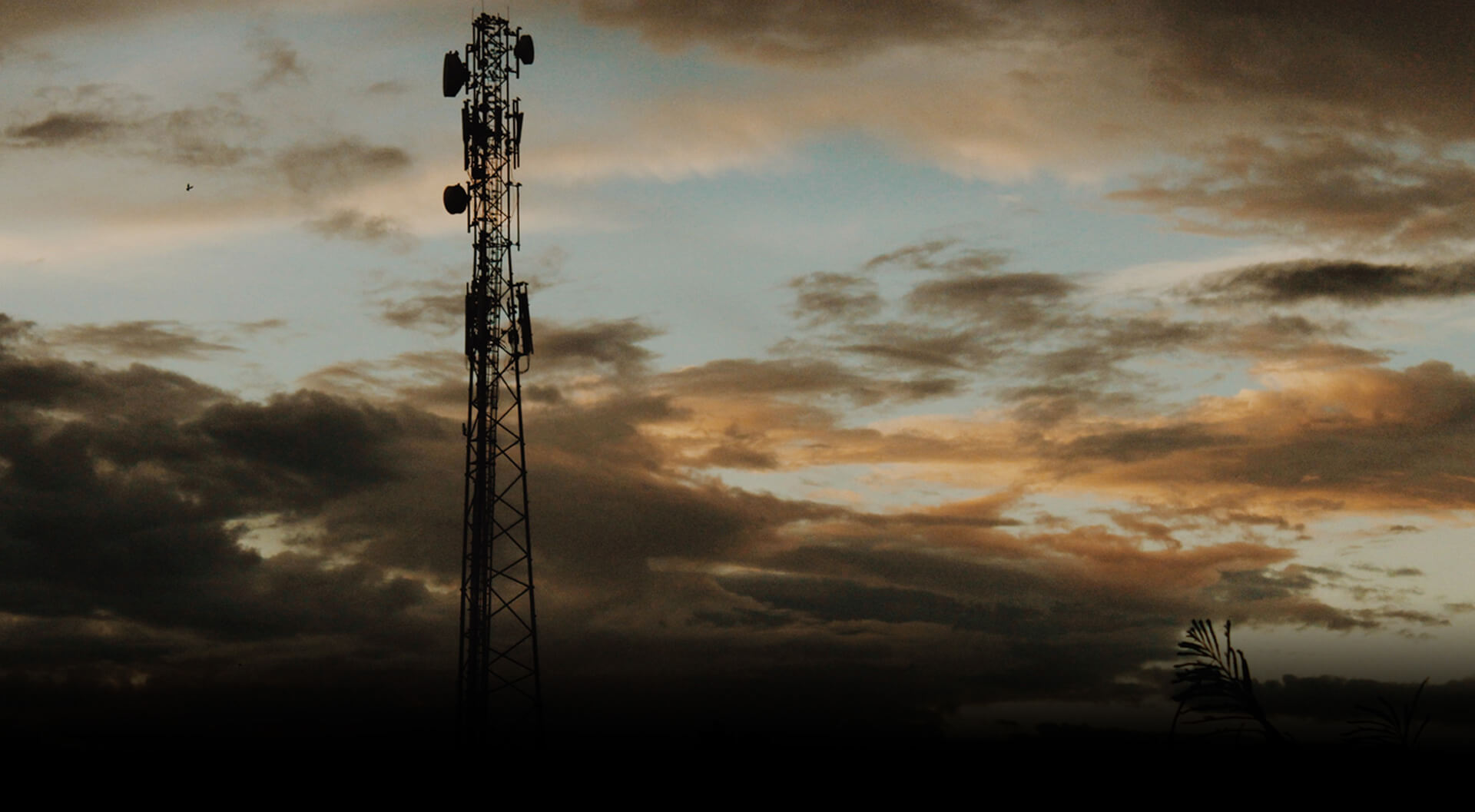 Communication mast at sunset